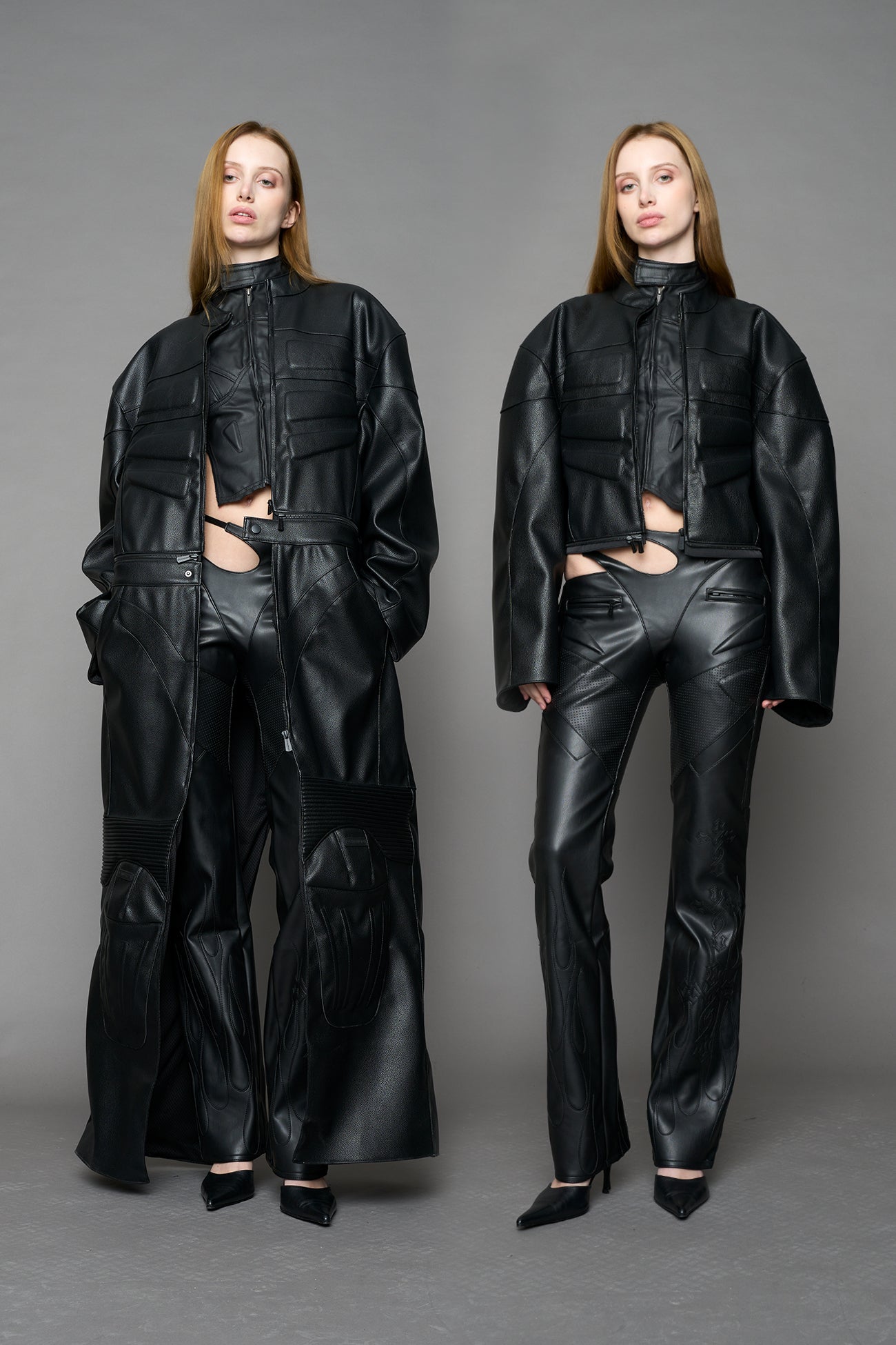 Detachable moto long coat in black black vegan leather inspired by a deconstructed full-body motocross racing suit, featuring padded panel details and a detachable zip design for two-way wear.