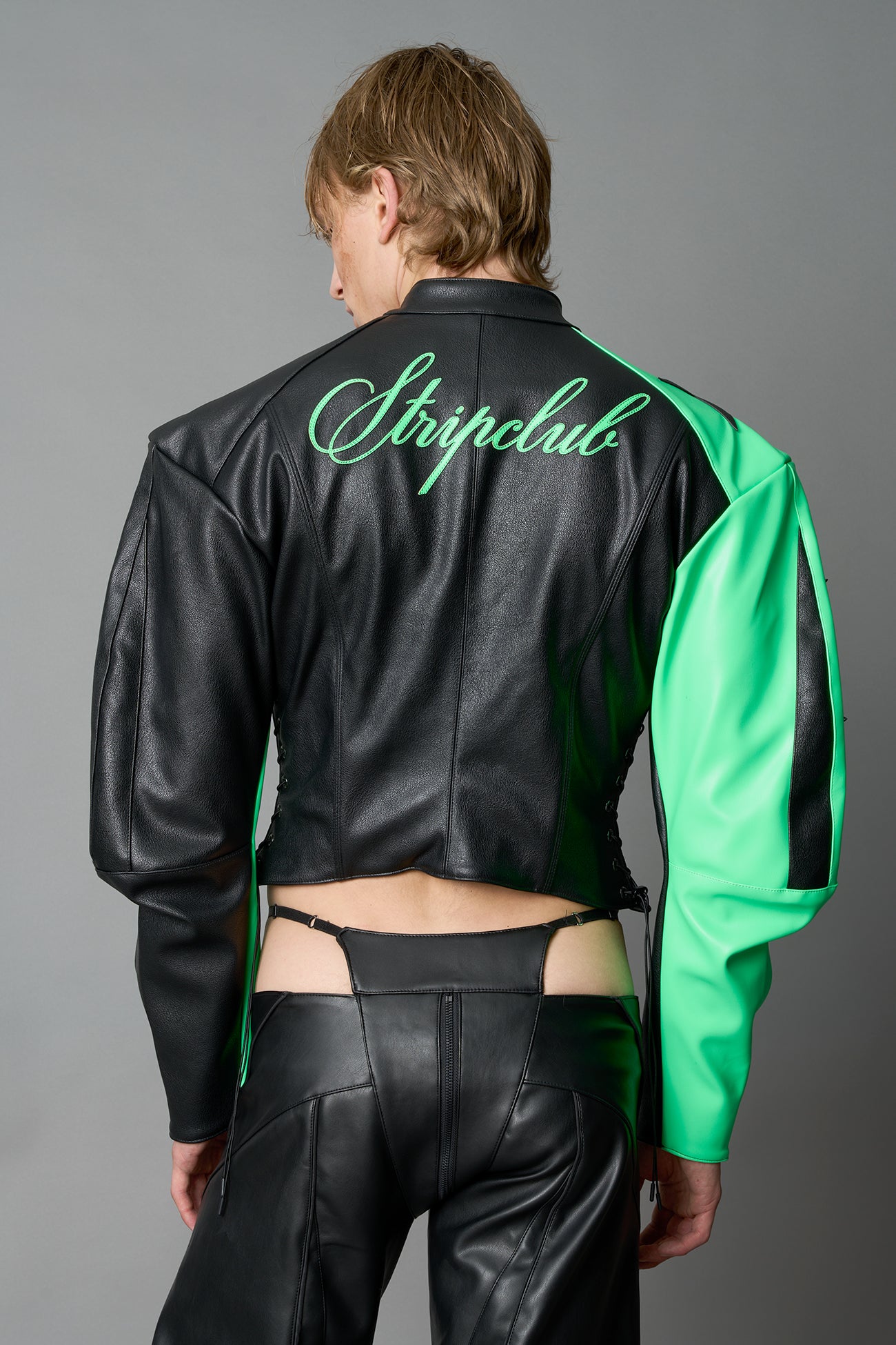 Green Namilia motocross jacket –  streetwear biker jacket with bold star graphics, zip front, and edgy moto-inspired fashion design in vegan PU leather